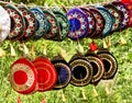 Colorful skull caps are on green grass background. Traditional muslim hat for crimeaÃ¢â¬â¢s tatar and souvenirs for tourist.